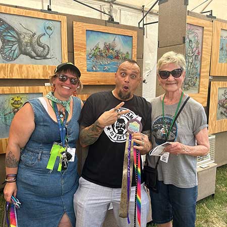 (L to R) Crystal Hammerschmidt, Art Show Director, Martha Rhea Award of Merit Winner Tai Taeoalii, Martha Rhea, Original Festival Executive Director